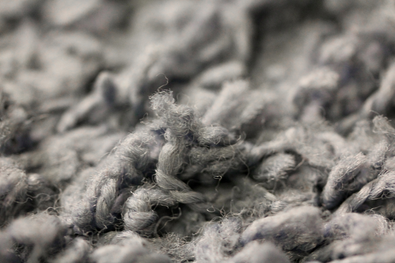 Macro photography of gray carpet long pile